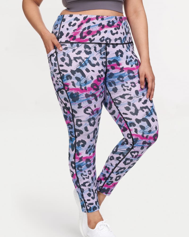 Front of a model wearing a size 1X Laney Full Length High Waist Pocket Leggings in Purple Leopard by Better Sports Performance. | dia_product_style_image_id:229574